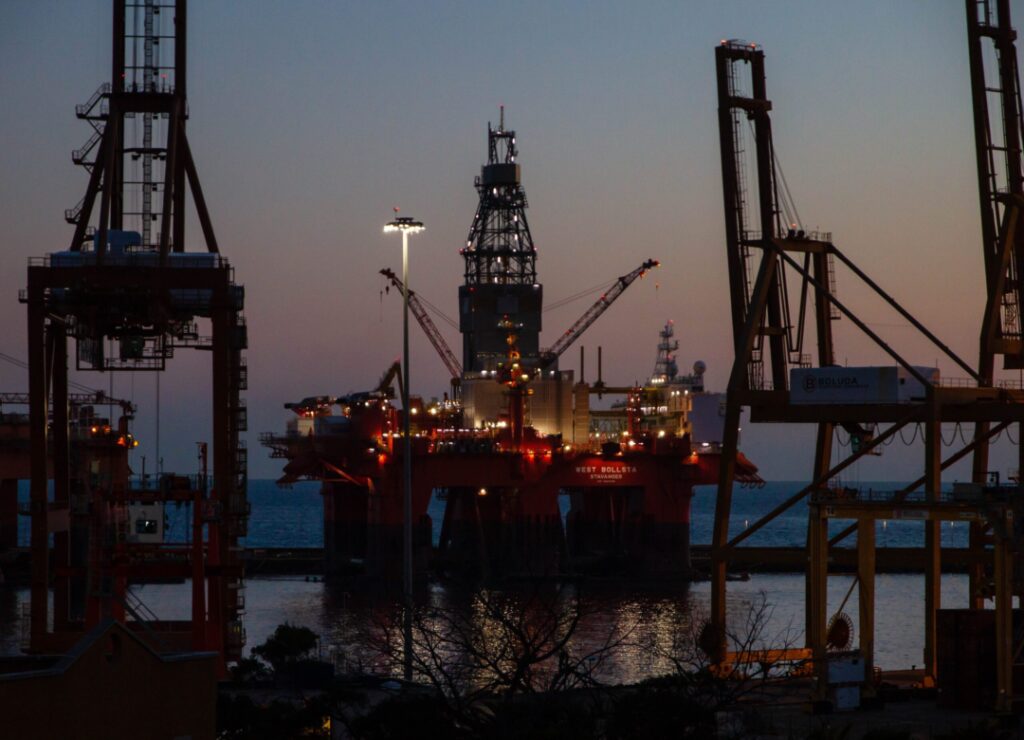 Offshore oil rig at night